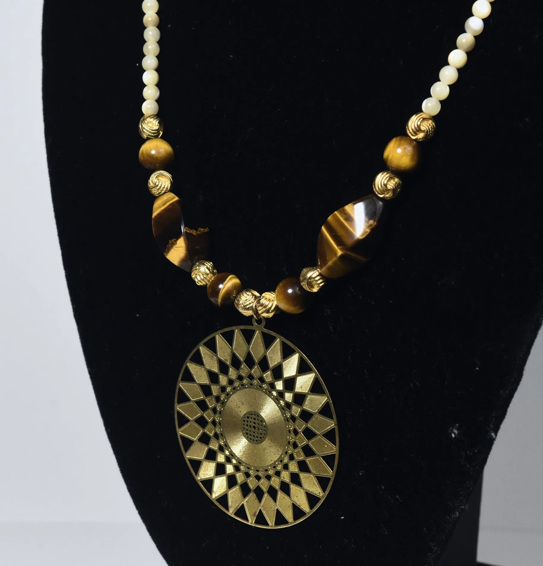 Carved Shell Bead, Brass and Tiger's Eye Necklace with Brass Pendant