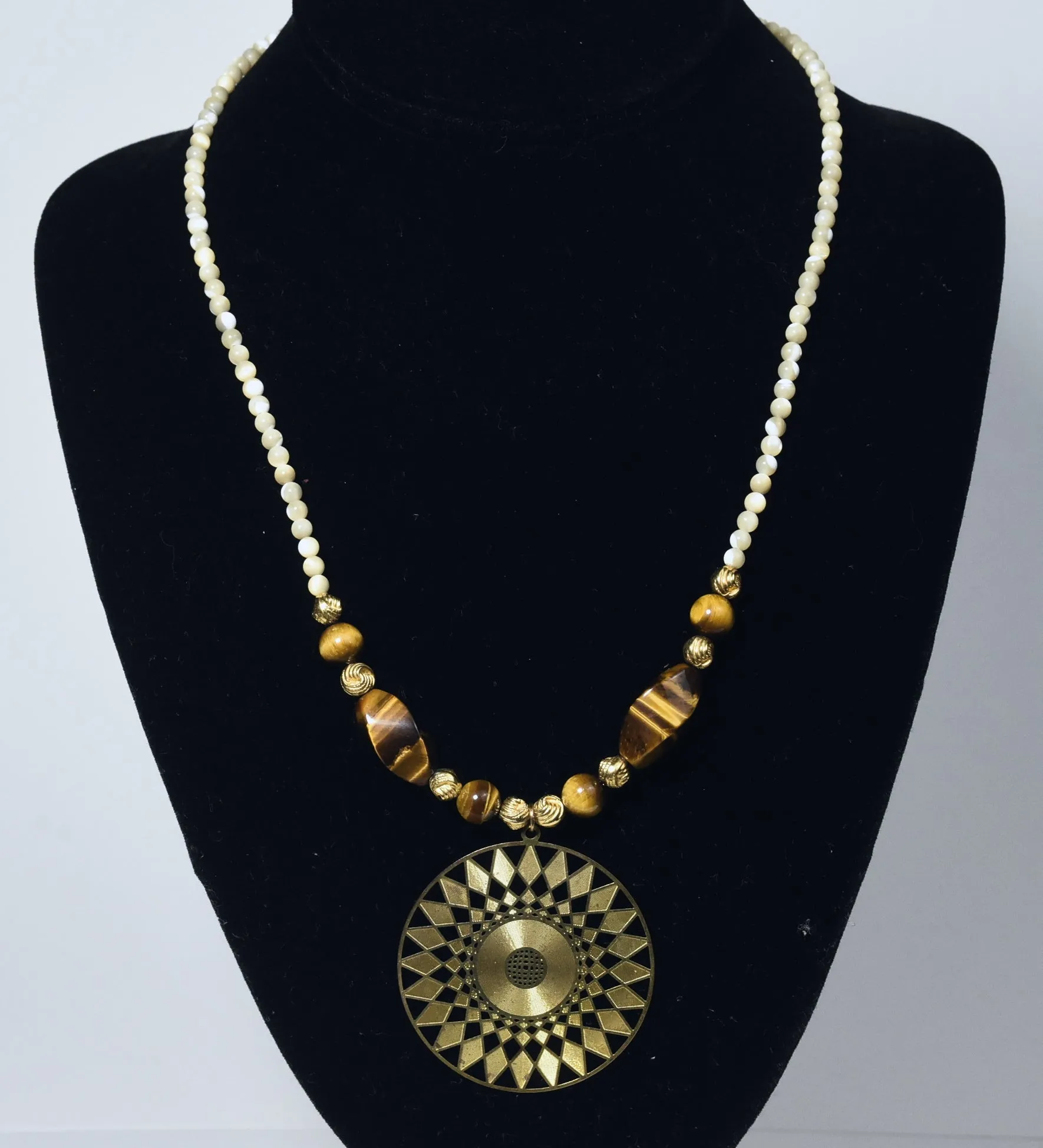 Carved Shell Bead, Brass and Tiger's Eye Necklace with Brass Pendant