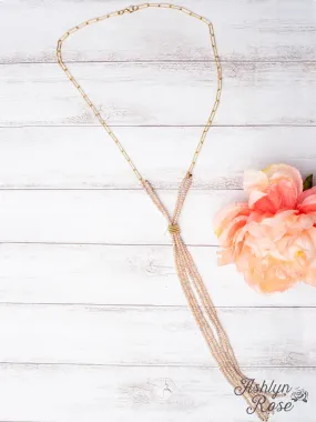 CHAMPAGNE POPPING LIGHT PINK CRYSTAL TASSEL ON A GOLD LINKED CHAIN NECKLACE