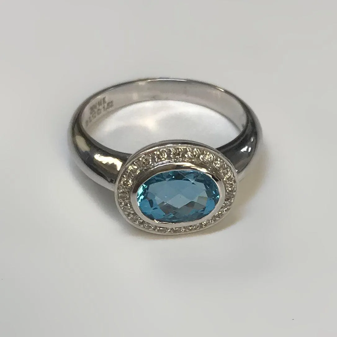 Oval Blue Topaz Ring with Diamonds