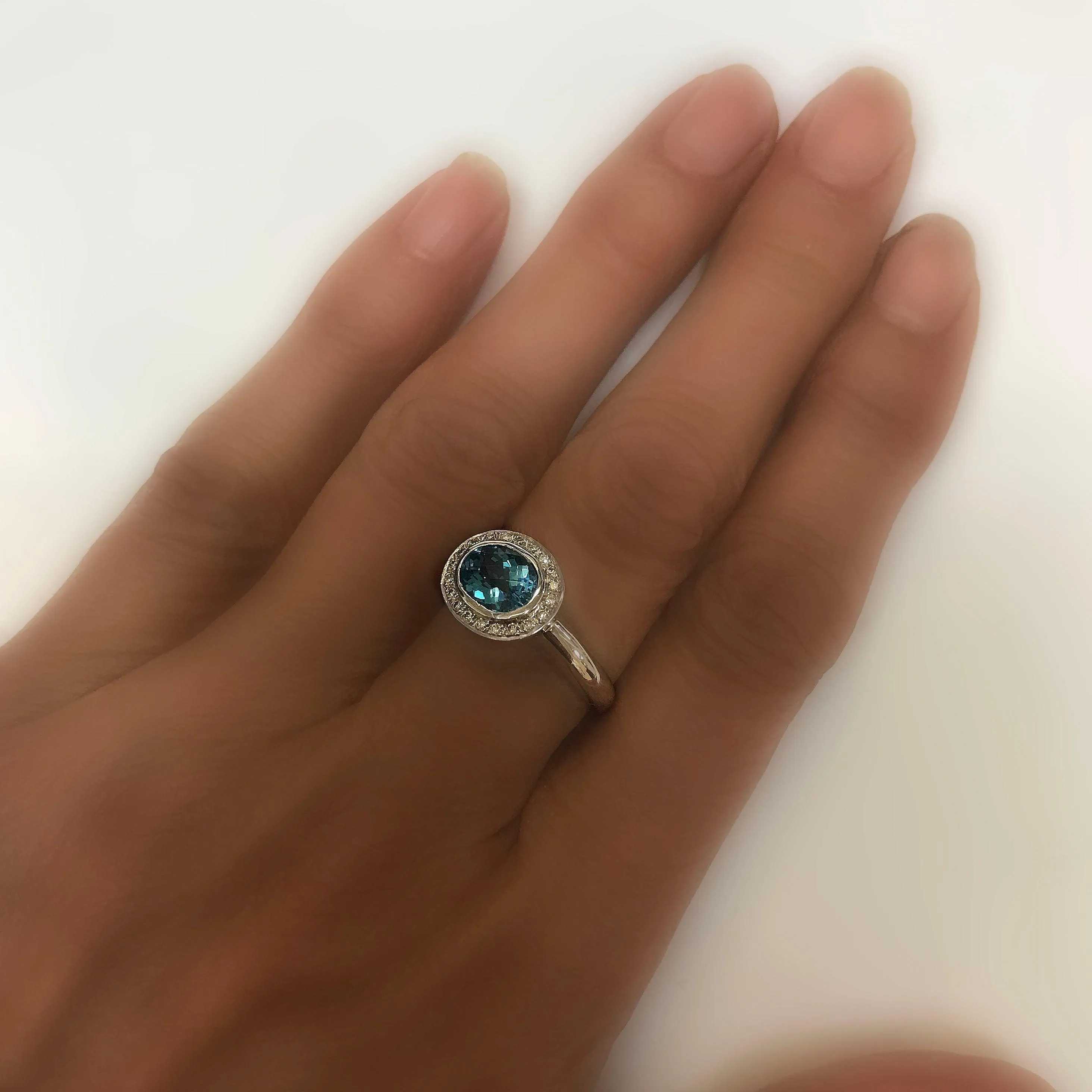 Oval Blue Topaz Ring with Diamonds