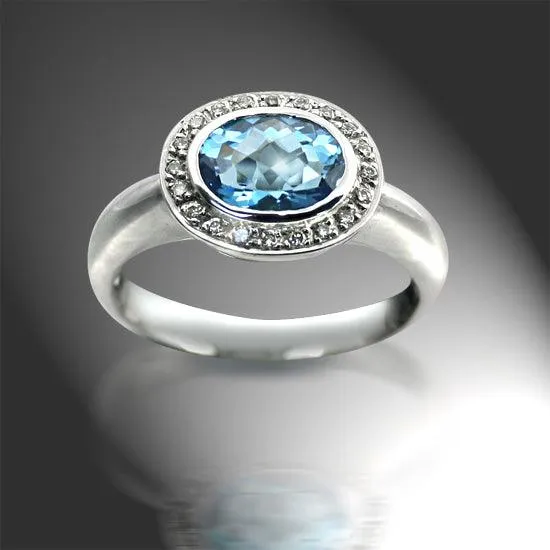 Oval Blue Topaz Ring with Diamonds