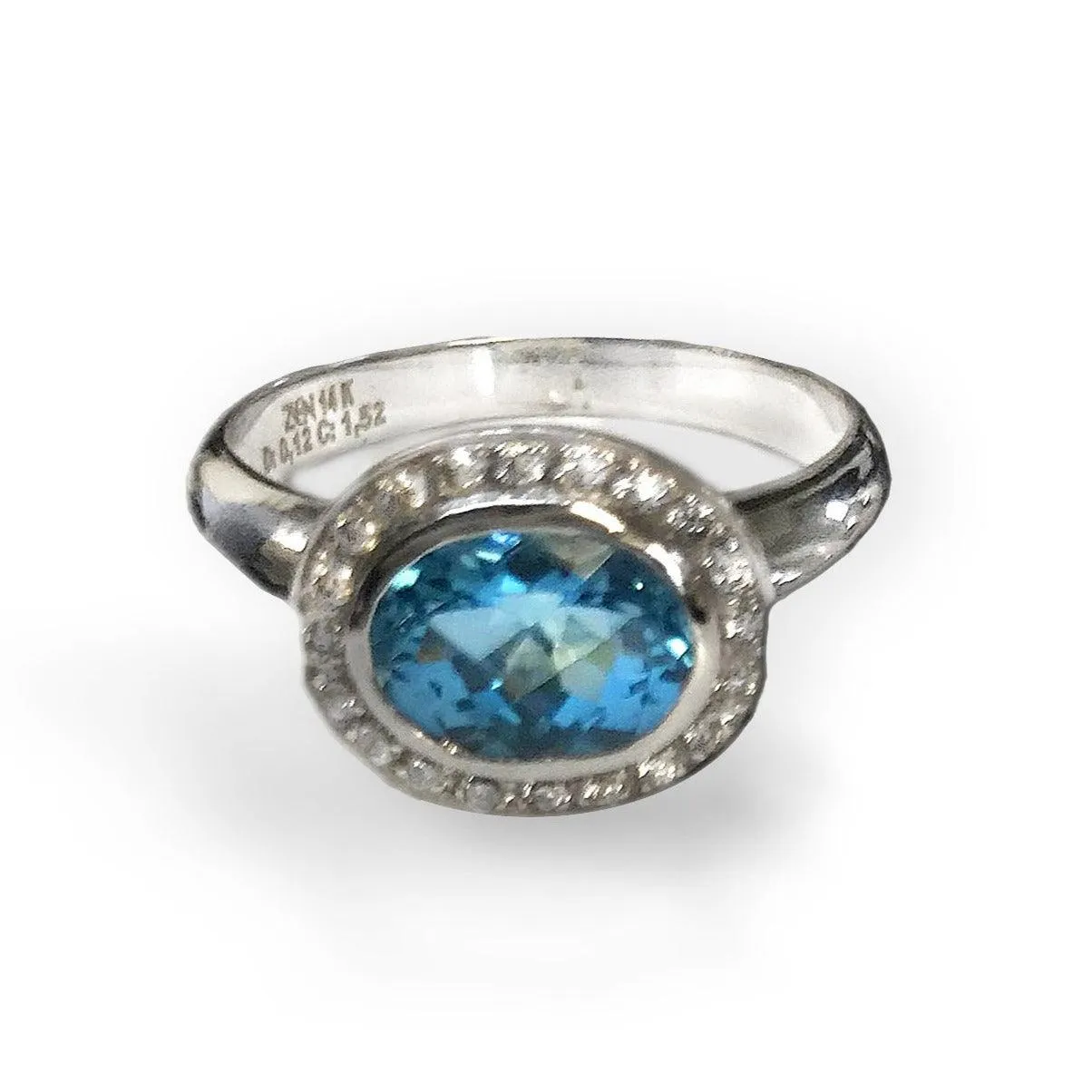 Oval Blue Topaz Ring with Diamonds