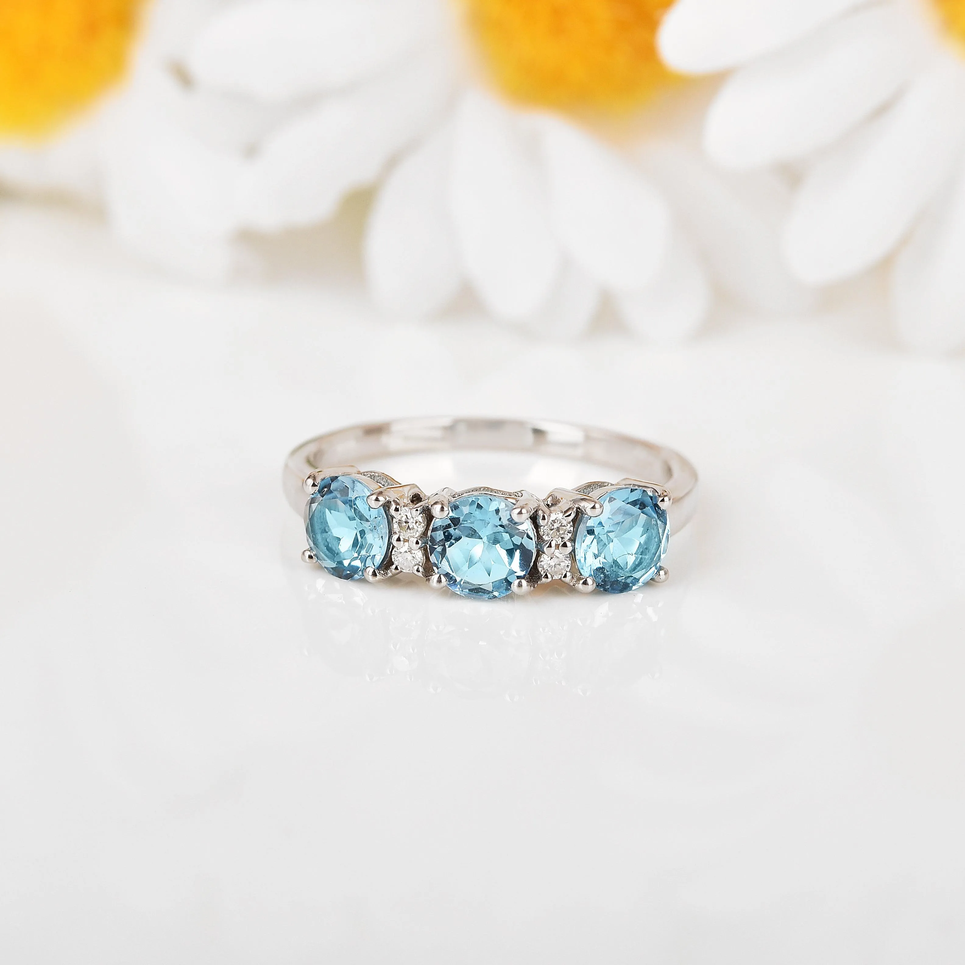 Three Stone Blue Topaz Ring